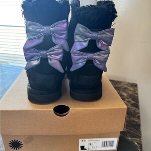 UGG Black Boots with Iridescent Purple Bows
